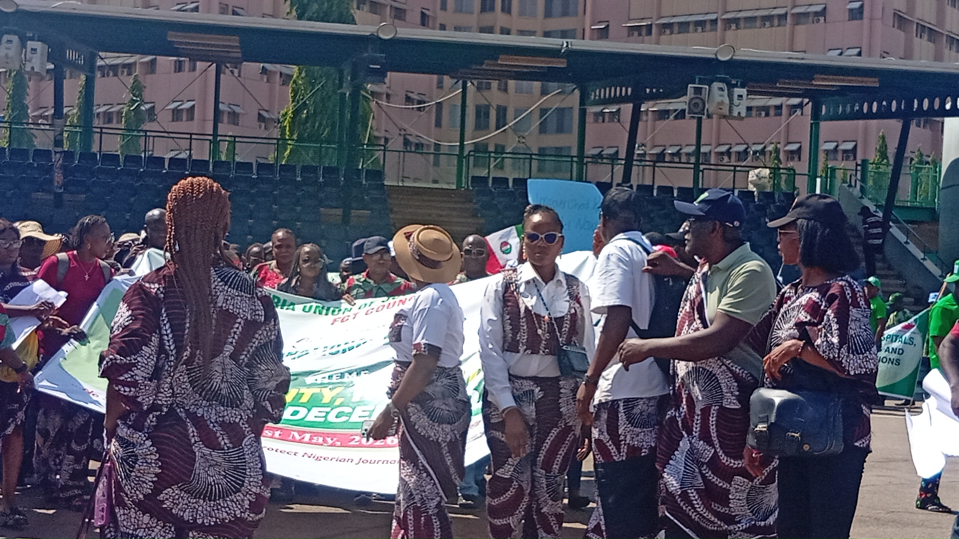 Members of the Nigeria Union of Journalists (NUJ) during the May Day march past at Eagle Square, Abuja