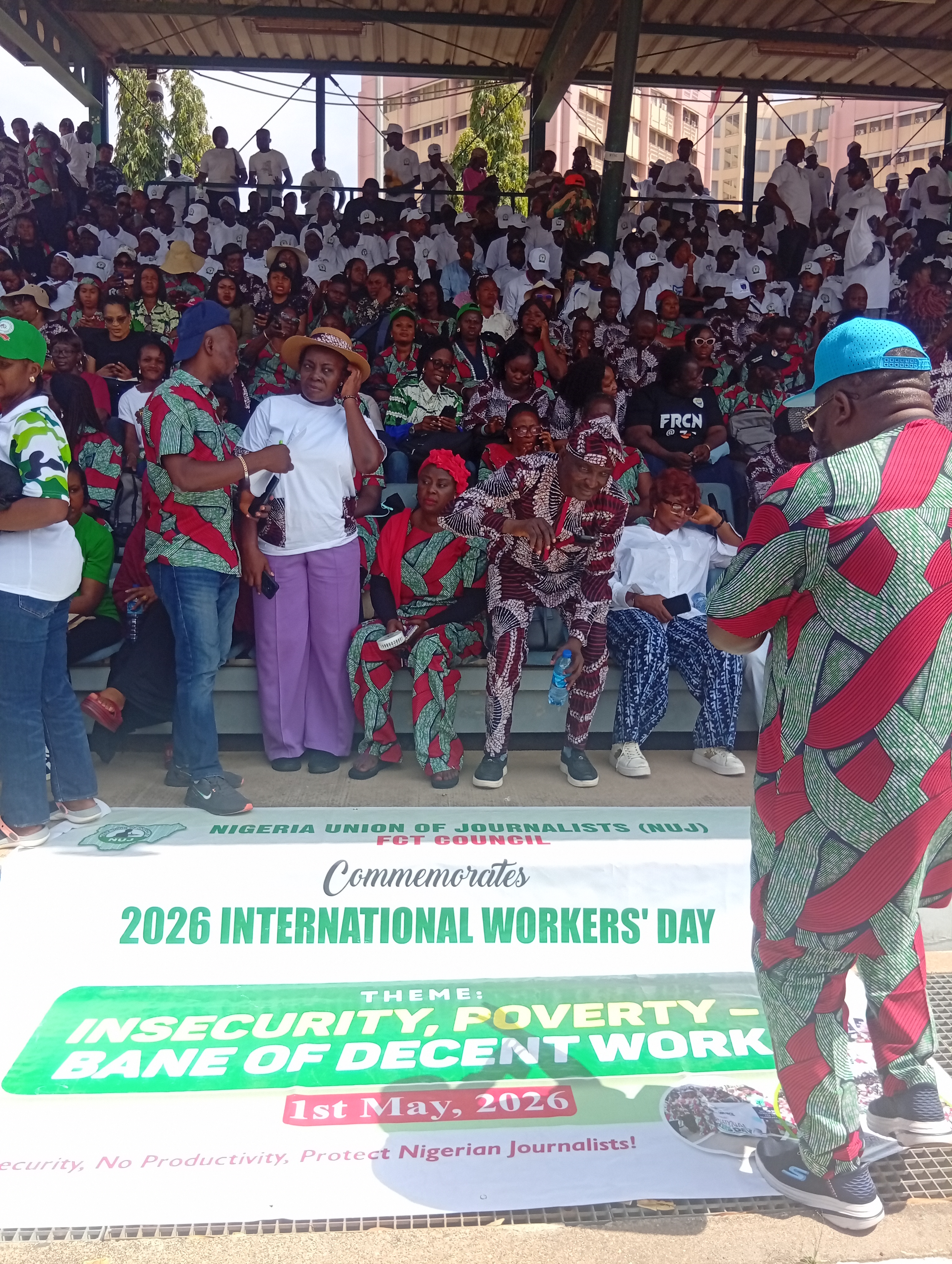 Members of the Nigeria Union of Journalists (NUJ) during the May Day march past at Eagle Square, Abuja